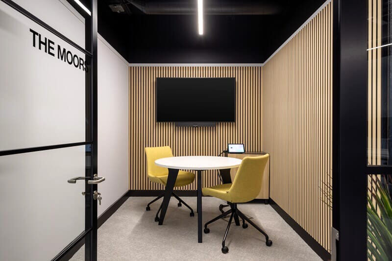 An image of the interior decor and signage for The Moors office space.